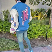 Fashionable baseball jacket with contrasting color stitching